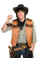 happy young cowboy with a bottle