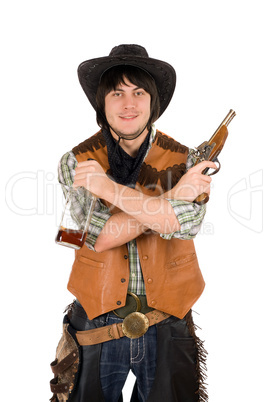 Smiling cowboy with a bottle and gun