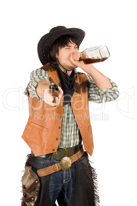Cowboy drinking whiskey from the bottle