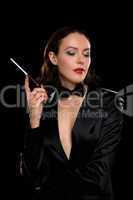 Attractive young woman with cigarette