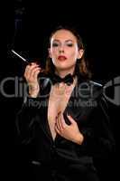 Portrait of a beautiful young woman with cigarette
