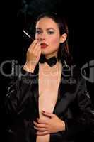 Young brunette with cigarette. Isolated