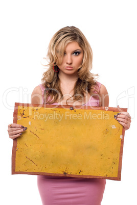 Young woman posing with yellow board