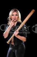 Sexy young woman with a bat