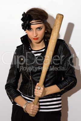 Pretty young woman with a bat