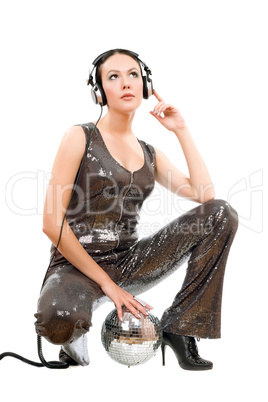 Attractive young brunette in headphones