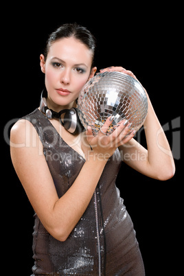 Portrait of beautiful young brunette with a mirror ball