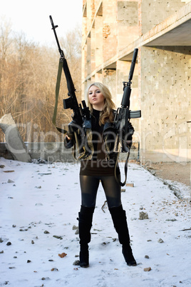 Serious girl with weapon