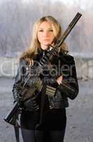 Armed beautiful young woman