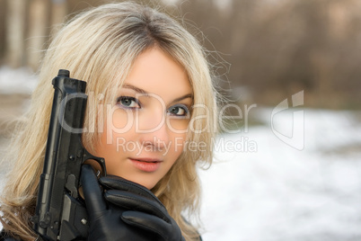 Sweet woman with a weapon