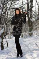 Attractive young woman with a rifle