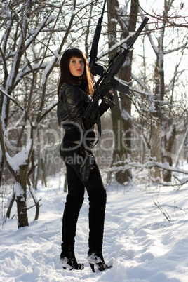 Armed pretty young lady