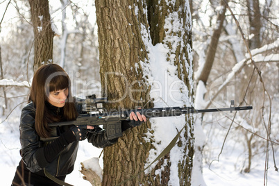 Beautiful woman with a sniper rifle