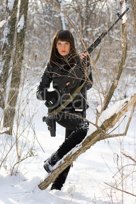 Attractive woman with a sniper rifle