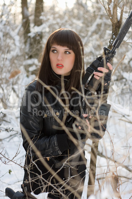 sexy young lady with a rifle