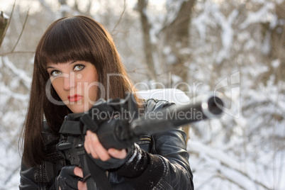 strong young lady with a rifle