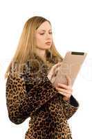 Blonde looking at the tablet pc