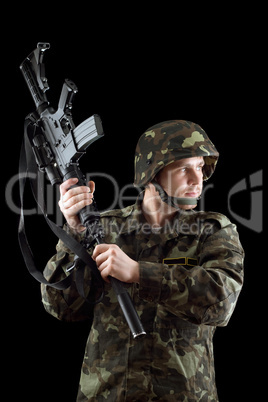 Soldier threatening with a rifle