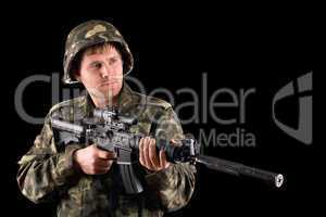 Arming soldier and a rifle
