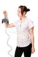 Charming brunette girl with a joystick