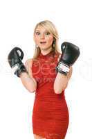 Charming blond girl in boxing gloves