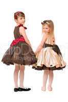 Two little girls in a dress. Isolated