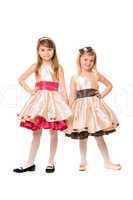 Two beautiful little girls in a dress