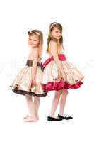 Two nice little girls in a dress