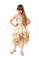 Beautiful little girl in a beige dress