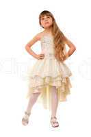 Lovely little girl in a beige dress