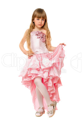 Little girl in a chic pink dress