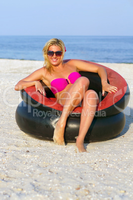 Pretty girl sitting in an chair