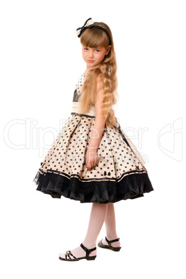 Attractive little girl in a dress