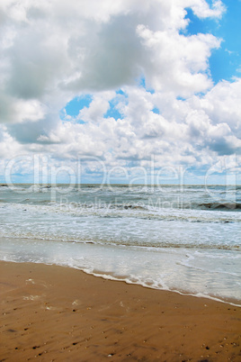 Cloudy sky over the stormy sea