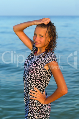 attractive teen girl in wet dress