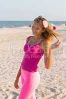 cheerful teen girl on the beach