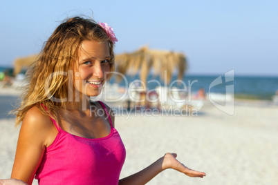 happy teen girl on the beach