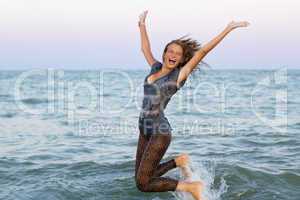 Cheerful wet teen girl