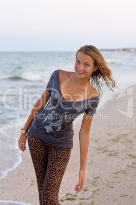 smiling girl in wet clothes