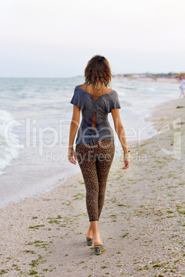 Cute girl in wet clothes