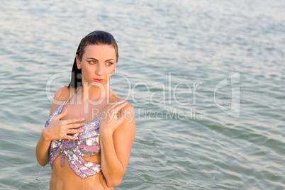 sexy wet young woman in the water