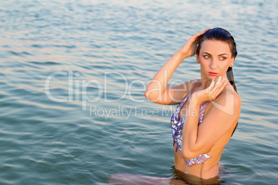 cute young woman in the water