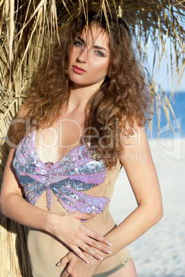 Beautiful young woman on a beach