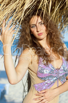 Lovely young woman on a beach