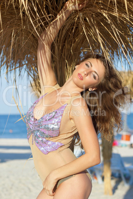 Expressive young woman on a beach