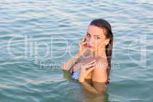 wet young woman in the water