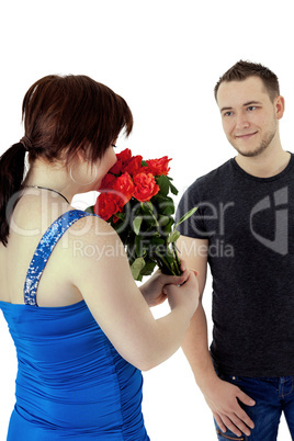 Woman gets flowers from man