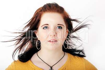 Flying hair of a young woman