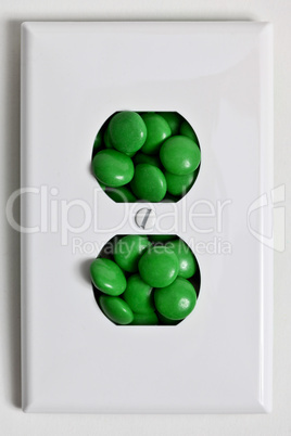 Electrical plate with green candy