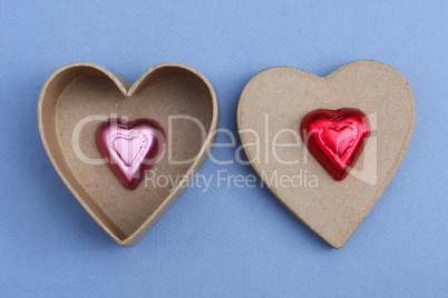 Paper and chocolate hearts